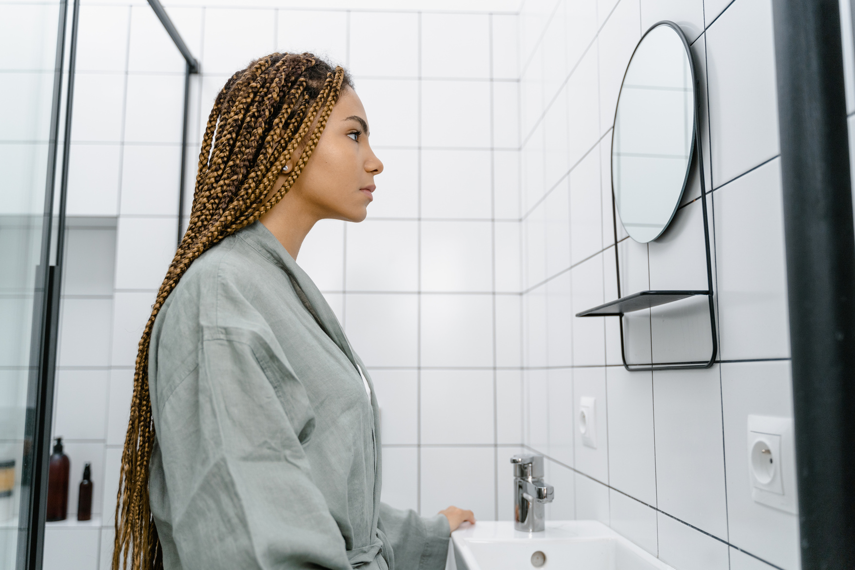 Woman looking at a Mirror